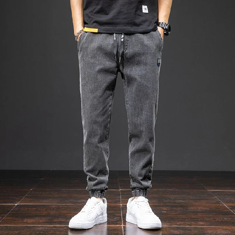 men Large size elastic workwear jeans Male ankle tied Harlan pants Straight Loose Large Size M-8XL size trendy loose Trousers