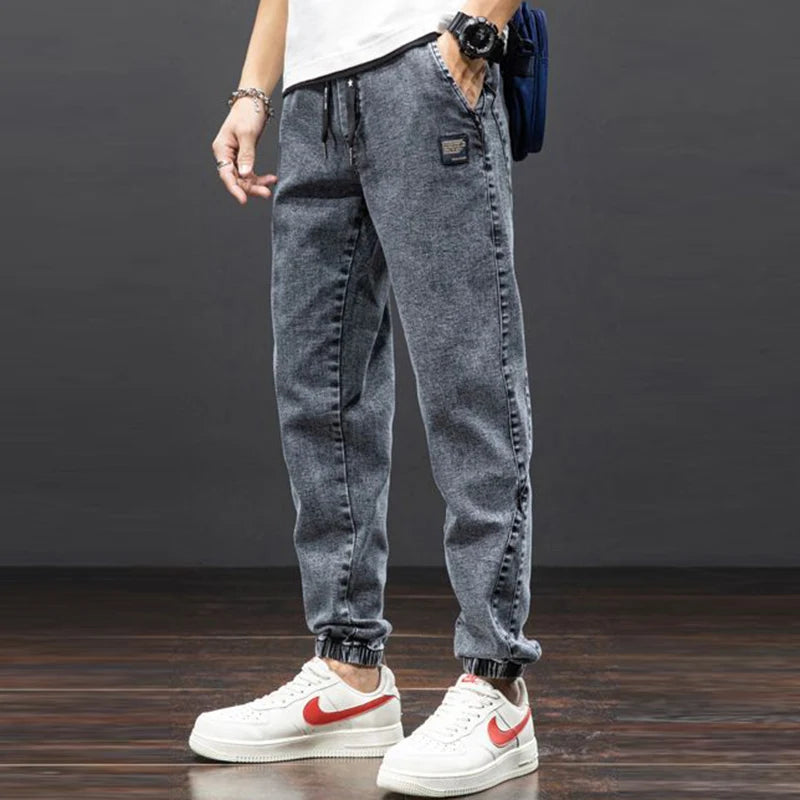 men Large size elastic workwear jeans Male ankle tied Harlan pants Straight Loose Large Size M-8XL size trendy loose Trousers