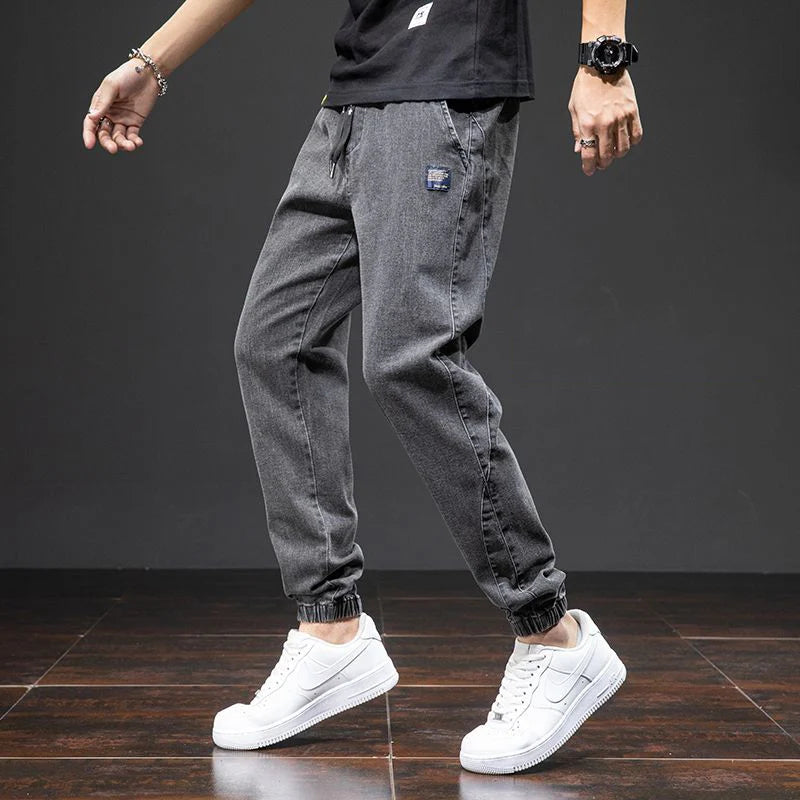 men Large size elastic workwear jeans Male ankle tied Harlan pants Straight Loose Large Size M-8XL size trendy loose Trousers