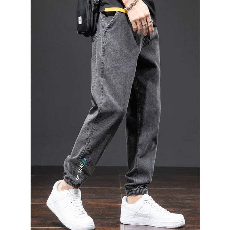 men Large size elastic workwear jeans Male ankle tied Harlan pants Straight Loose Large Size M-8XL size trendy loose Trousers