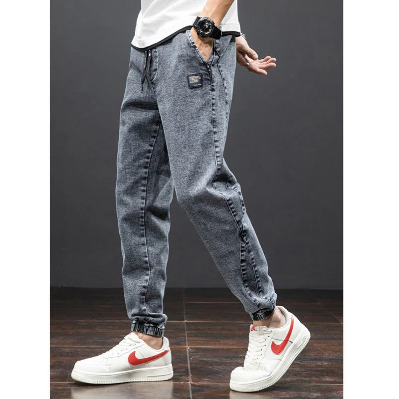 men Large size elastic workwear jeans Male ankle tied Harlan pants Straight Loose Large Size M-8XL size trendy loose Trousers