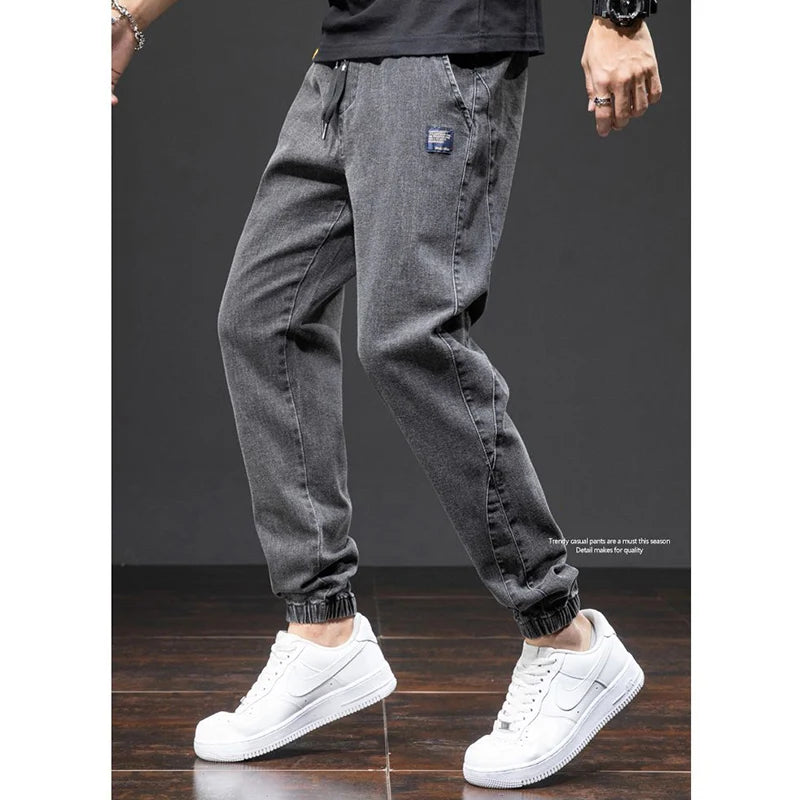 men Large size elastic workwear jeans Male ankle tied Harlan pants Straight Loose Large Size M-8XL size trendy loose Trousers