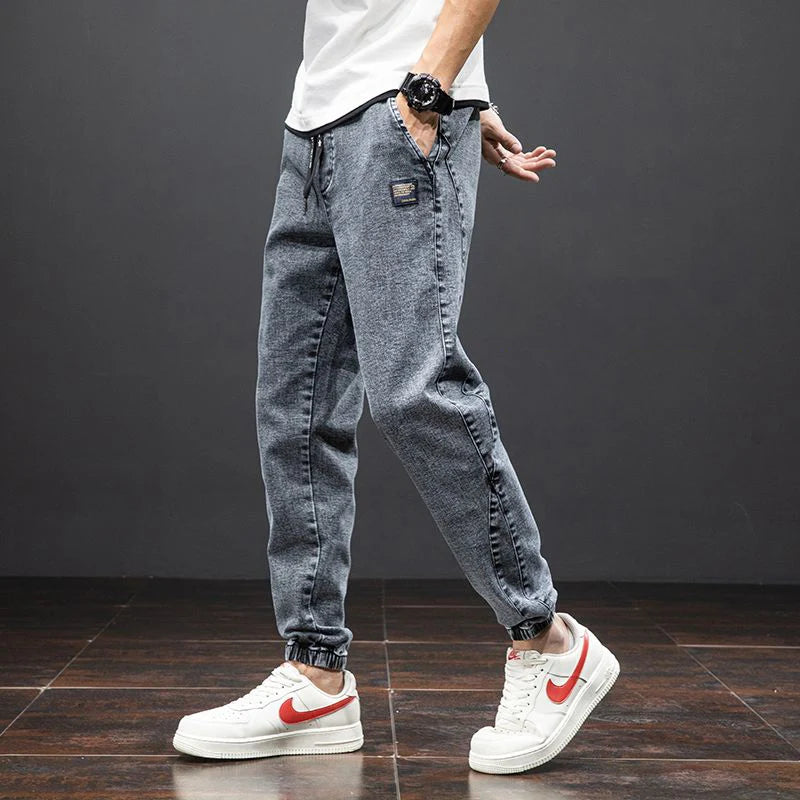 men Large size elastic workwear jeans Male ankle tied Harlan pants Straight Loose Large Size M-8XL size trendy loose Trousers