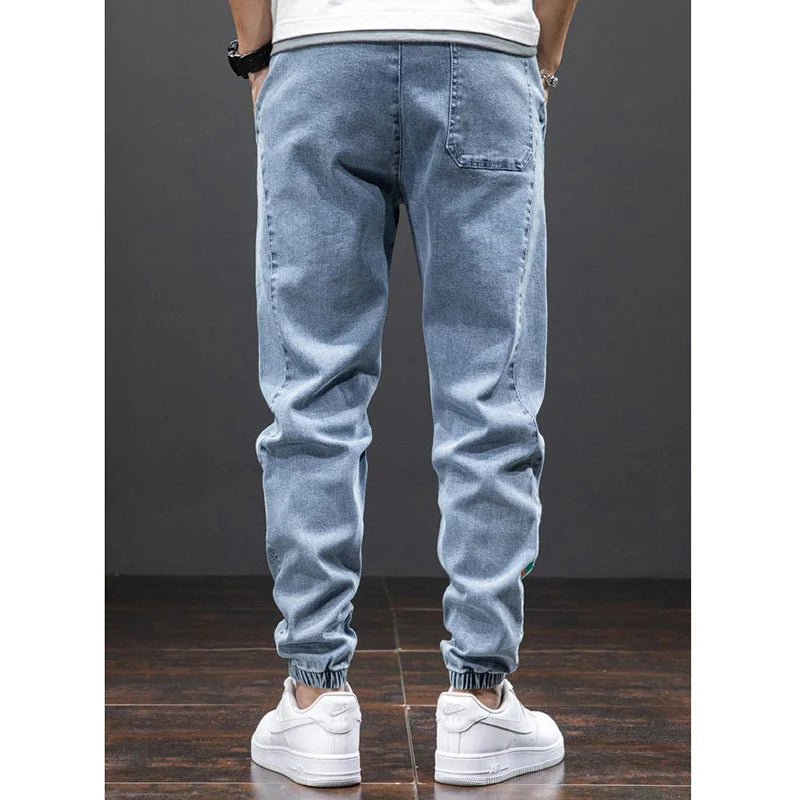 men Large size elastic workwear jeans Male ankle tied Harlan pants Straight Loose Large Size M-8XL size trendy loose Trousers