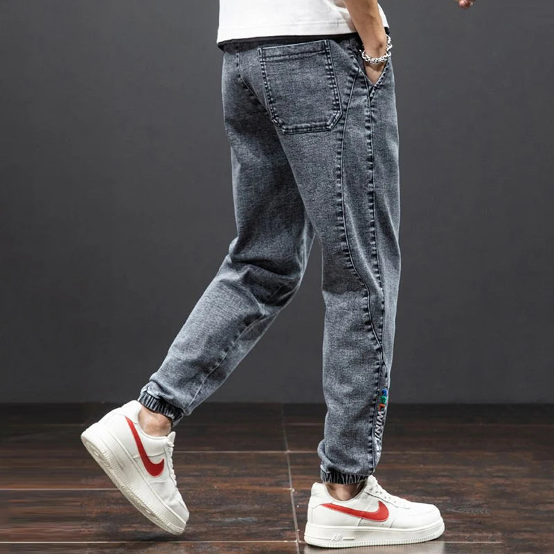 men Large size elastic workwear jeans Male ankle tied Harlan pants Straight Loose Large Size M-8XL size trendy loose Trousers