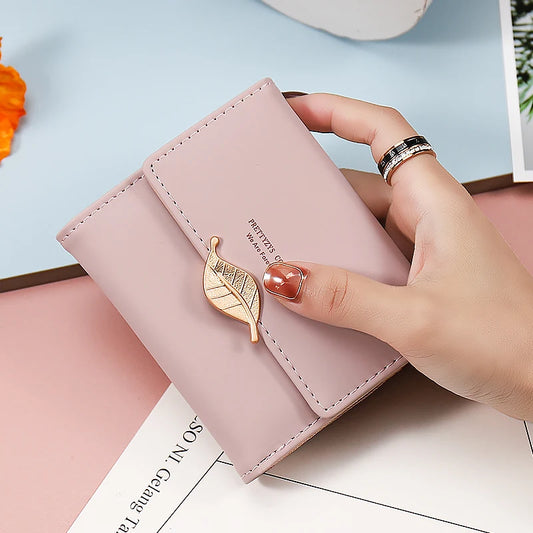 2024 Purse women's short high-end boutique fashion personality hardware leaf buckle short three fold bag multi-card folding stud