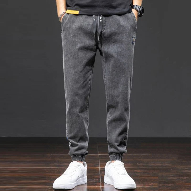 men Large size elastic workwear jeans Male ankle tied Harlan pants Straight Loose Large Size M-8XL size trendy loose Trousers