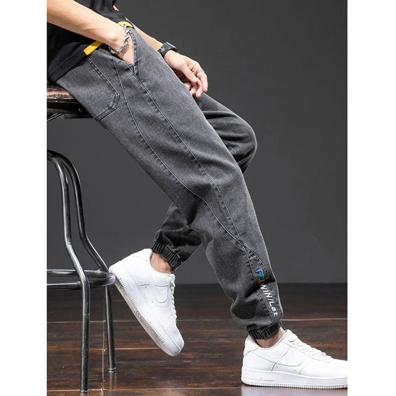 men Large size elastic workwear jeans Male ankle tied Harlan pants Straight Loose Large Size M-8XL size trendy loose Trousers