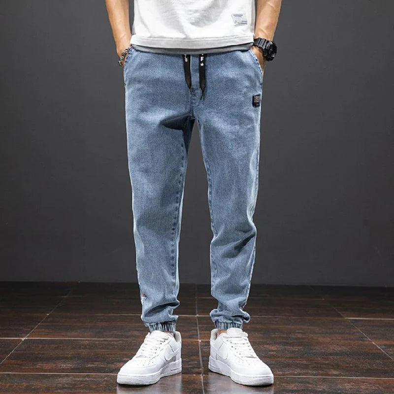 men Large size elastic workwear jeans Male ankle tied Harlan pants Straight Loose Large Size M-8XL size trendy loose Trousers