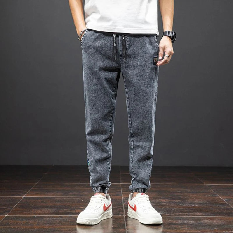 men Large size elastic workwear jeans Male ankle tied Harlan pants Straight Loose Large Size M-8XL size trendy loose Trousers