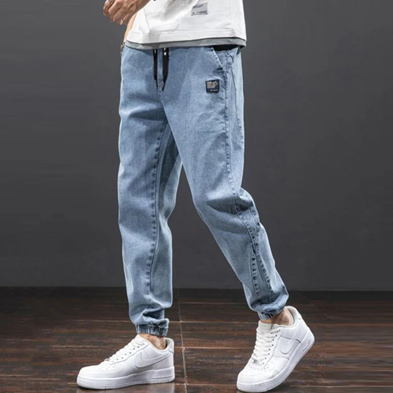 men Large size elastic workwear jeans Male ankle tied Harlan pants Straight Loose Large Size M-8XL size trendy loose Trousers