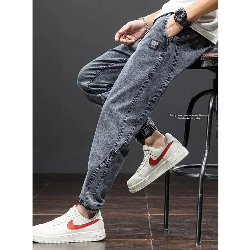 men Large size elastic workwear jeans Male ankle tied Harlan pants Straight Loose Large Size M-8XL size trendy loose Trousers