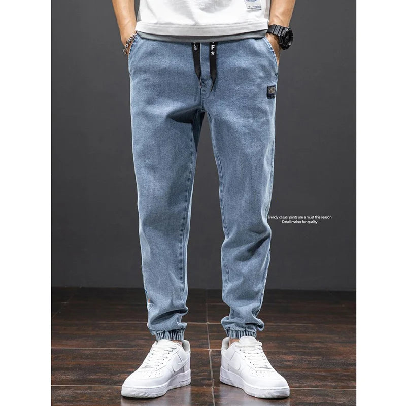 men Large size elastic workwear jeans Male ankle tied Harlan pants Straight Loose Large Size M-8XL size trendy loose Trousers